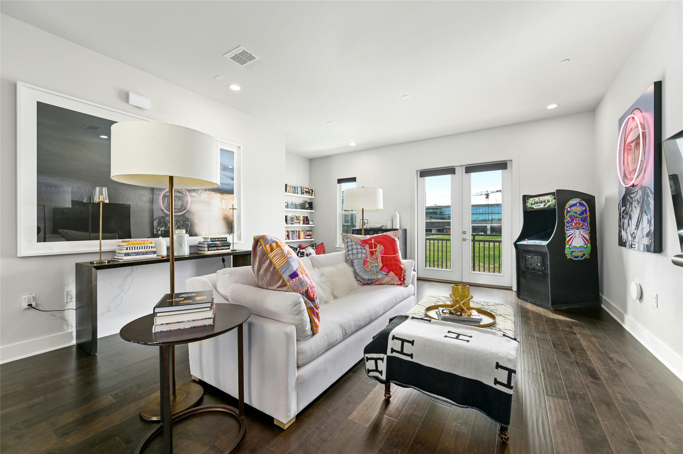 4604 Longevity Drive, Unit 306 Austin, TX 78731 - Photo 9 of 34 a living room with furniture and a flat screen tv