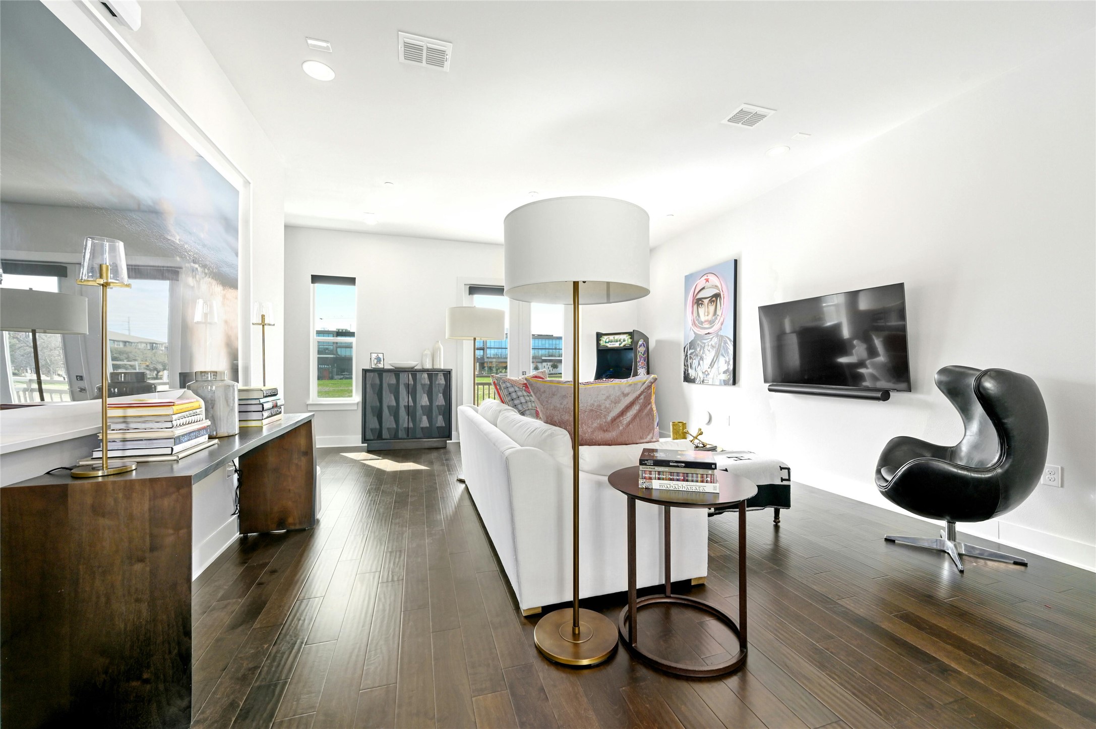 4604 Longevity Drive, Unit 306 Austin, TX 78731 - Photo 10 of 34 a living room with furniture and a flat screen tv