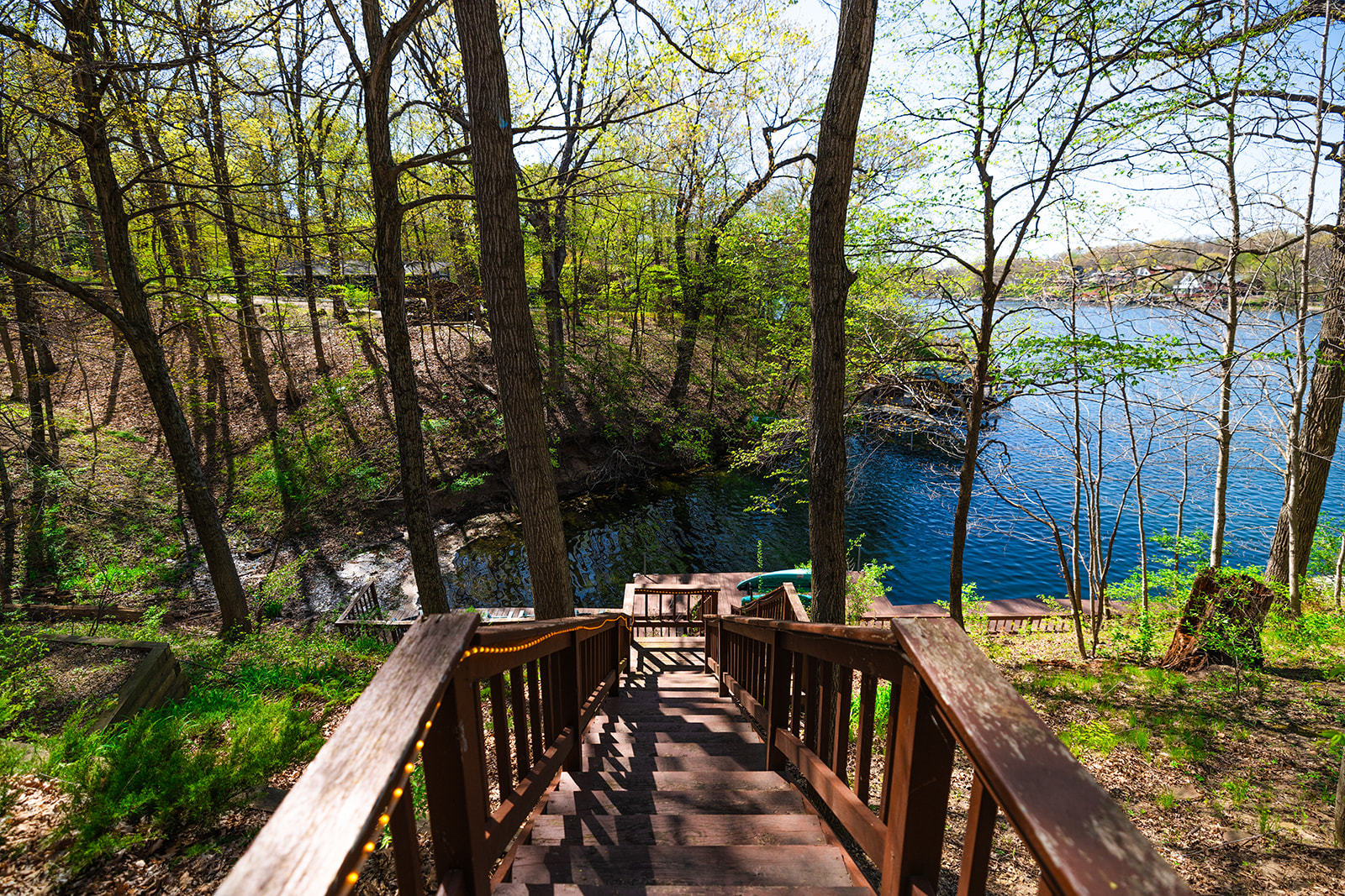 147 Lake Thunderbird Drive Putnam, IL 61560 - Photo 12 of 50 a view of deck with furniture and trees around