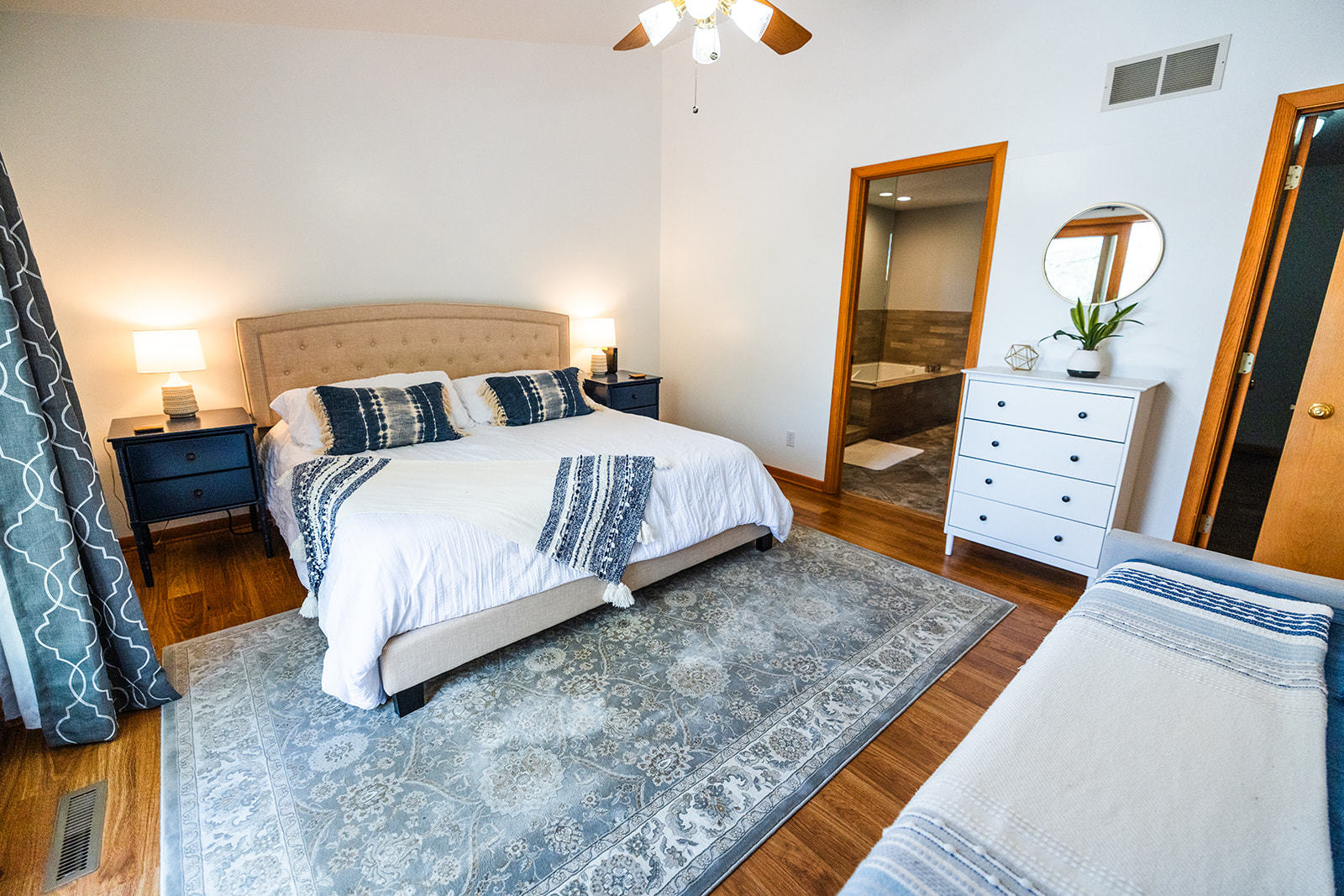 147 Lake Thunderbird Drive Putnam, IL 61560 - Photo 16 of 50 a bedroom with a bed and a dresser in it