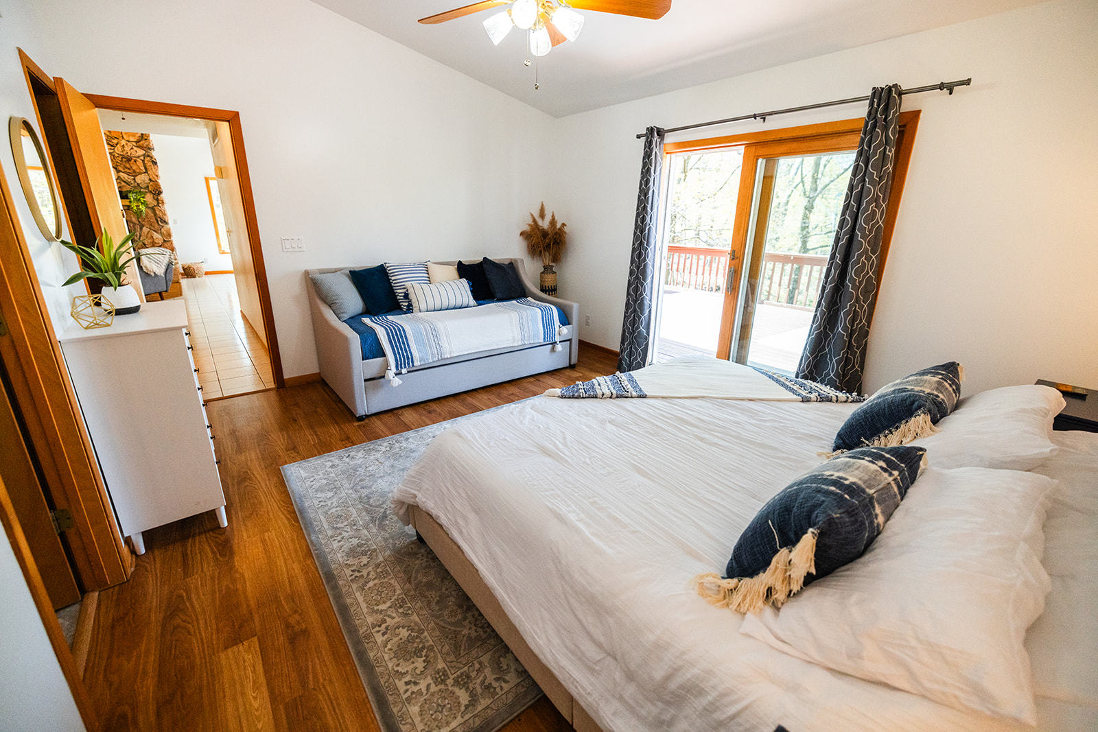 147 Lake Thunderbird Drive Putnam, IL 61560 - Photo 17 of 50 a bed sitting in a bedroom next to a window