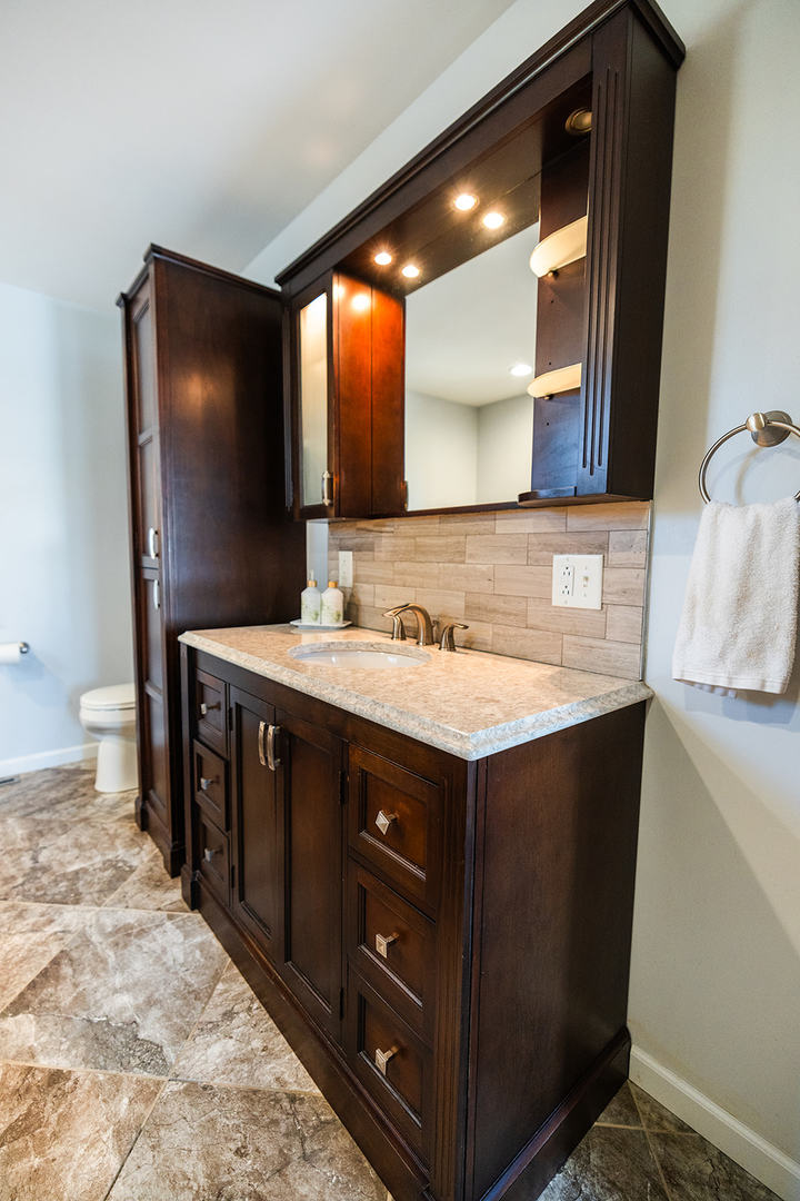 147 Lake Thunderbird Drive Putnam, IL 61560 - Photo 21 of 50 a bathroom with a sink vanity and a mirror