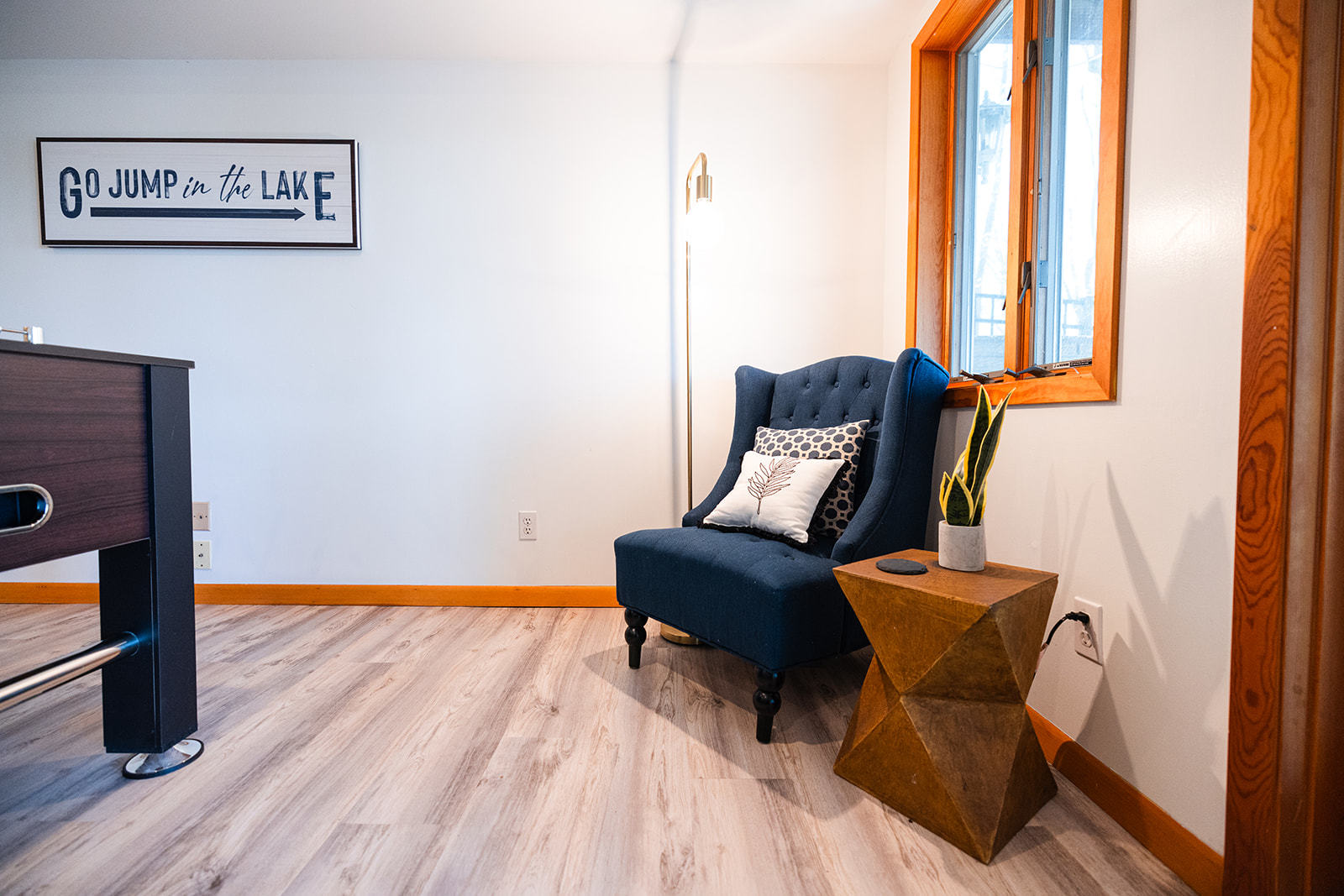 147 Lake Thunderbird Drive Putnam, IL 61560 - Photo 30 of 50 a blue chair sitting in front of a window