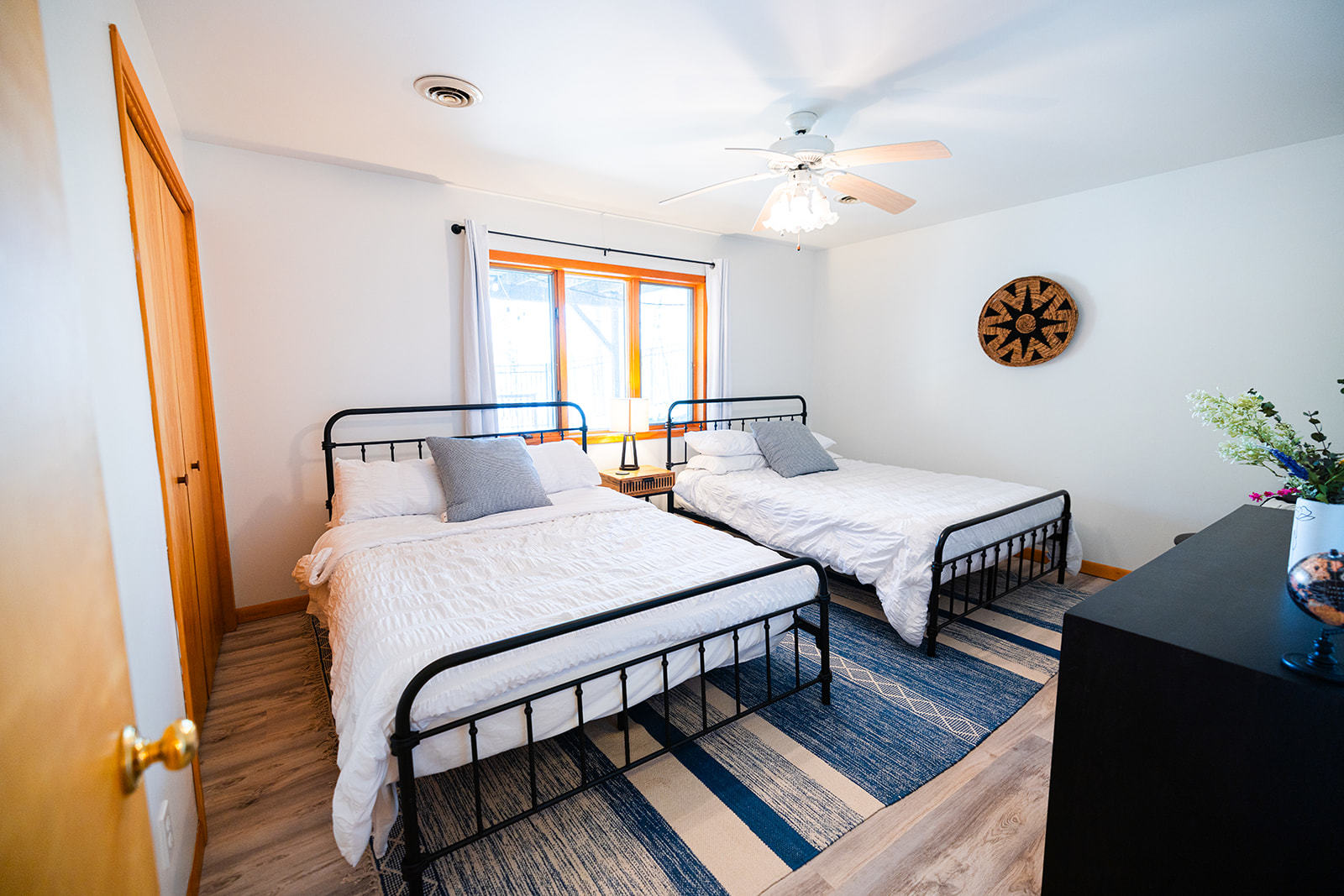 147 Lake Thunderbird Drive Putnam, IL 61560 - Photo 35 of 50 a bedroom with 2 bed and a dresser with wooden floor