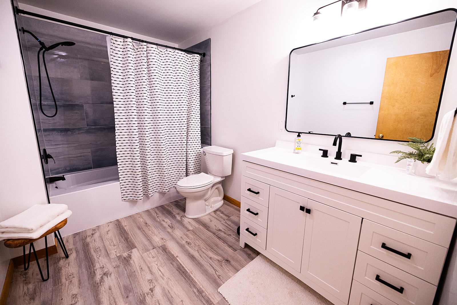 147 Lake Thunderbird Drive Putnam, IL 61560 - Photo 41 of 50 a bathroom with a sink mirror toilet and shower