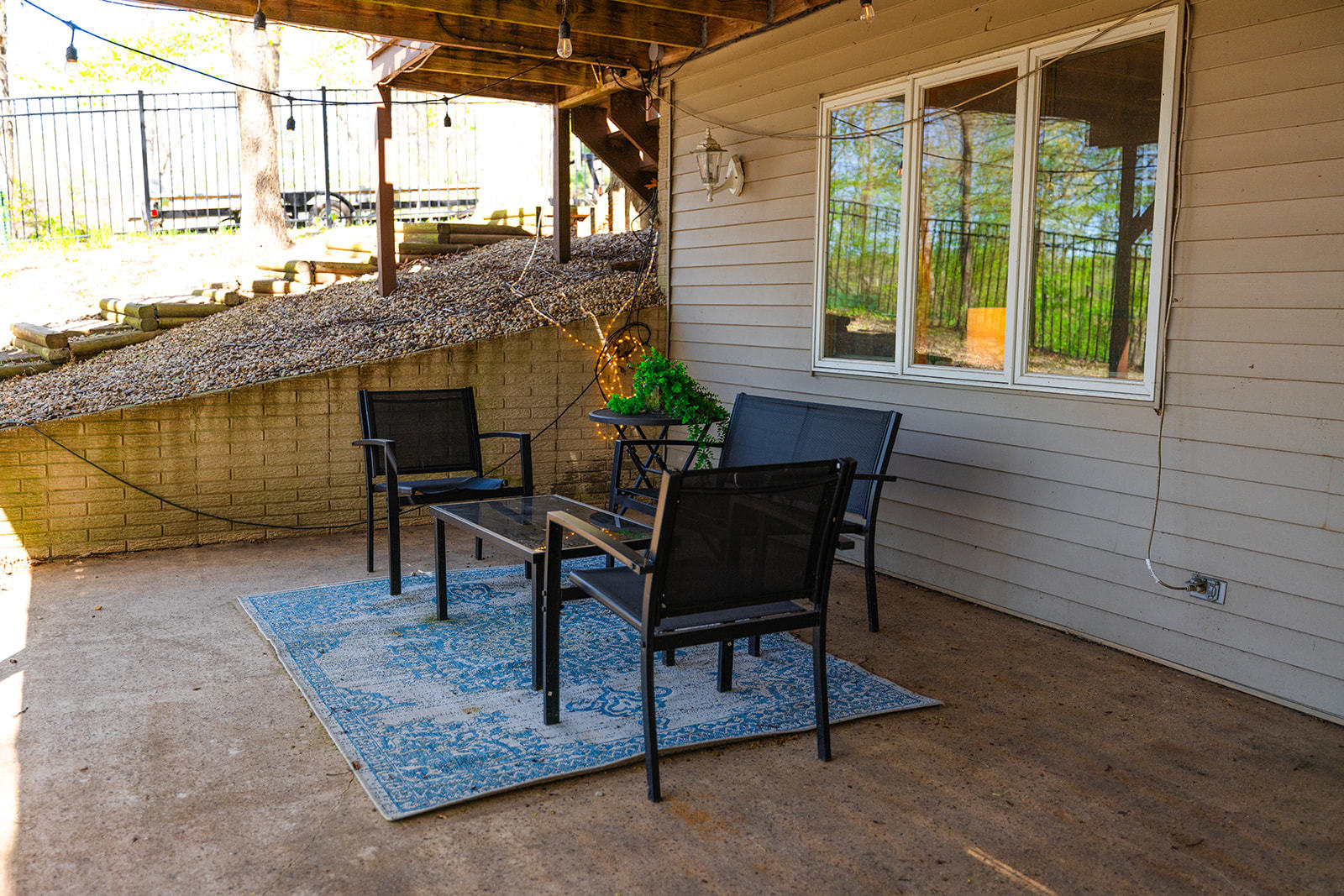 147 Lake Thunderbird Drive Putnam, IL 61560 - Photo 44 of 50 a balcony with furniture and a potted plant