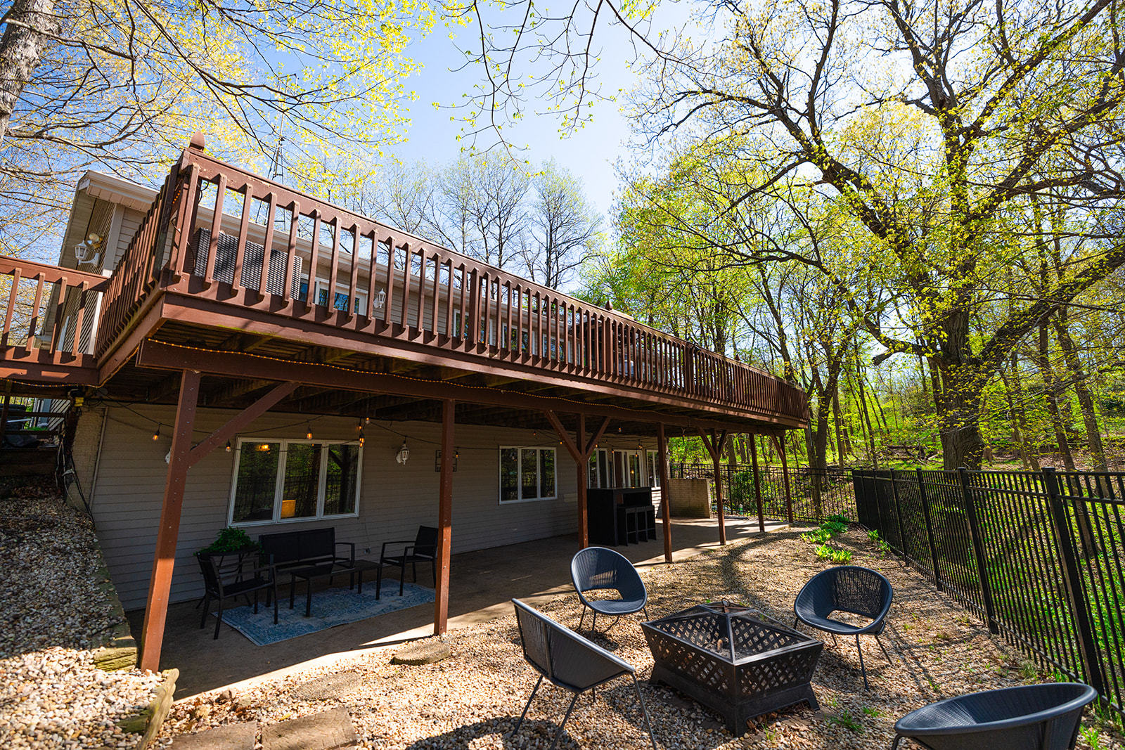 147 Lake Thunderbird Drive Putnam, IL 61560 - Photo 45 of 50 a backyard of a house with outdoor seating