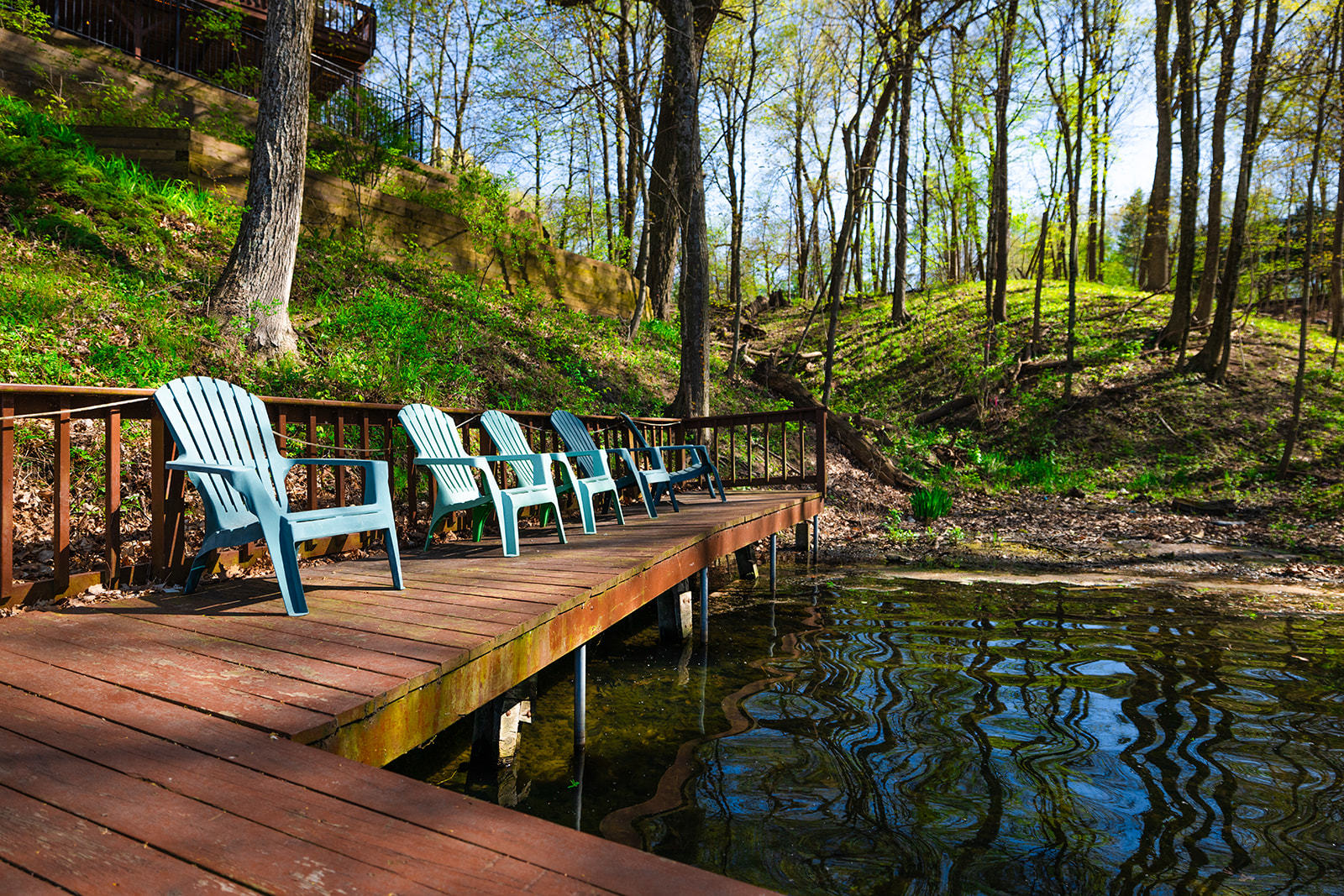 147 Lake Thunderbird Drive Putnam, IL 61560 - Photo 48 of 50 a view of a wooden deck with furniture