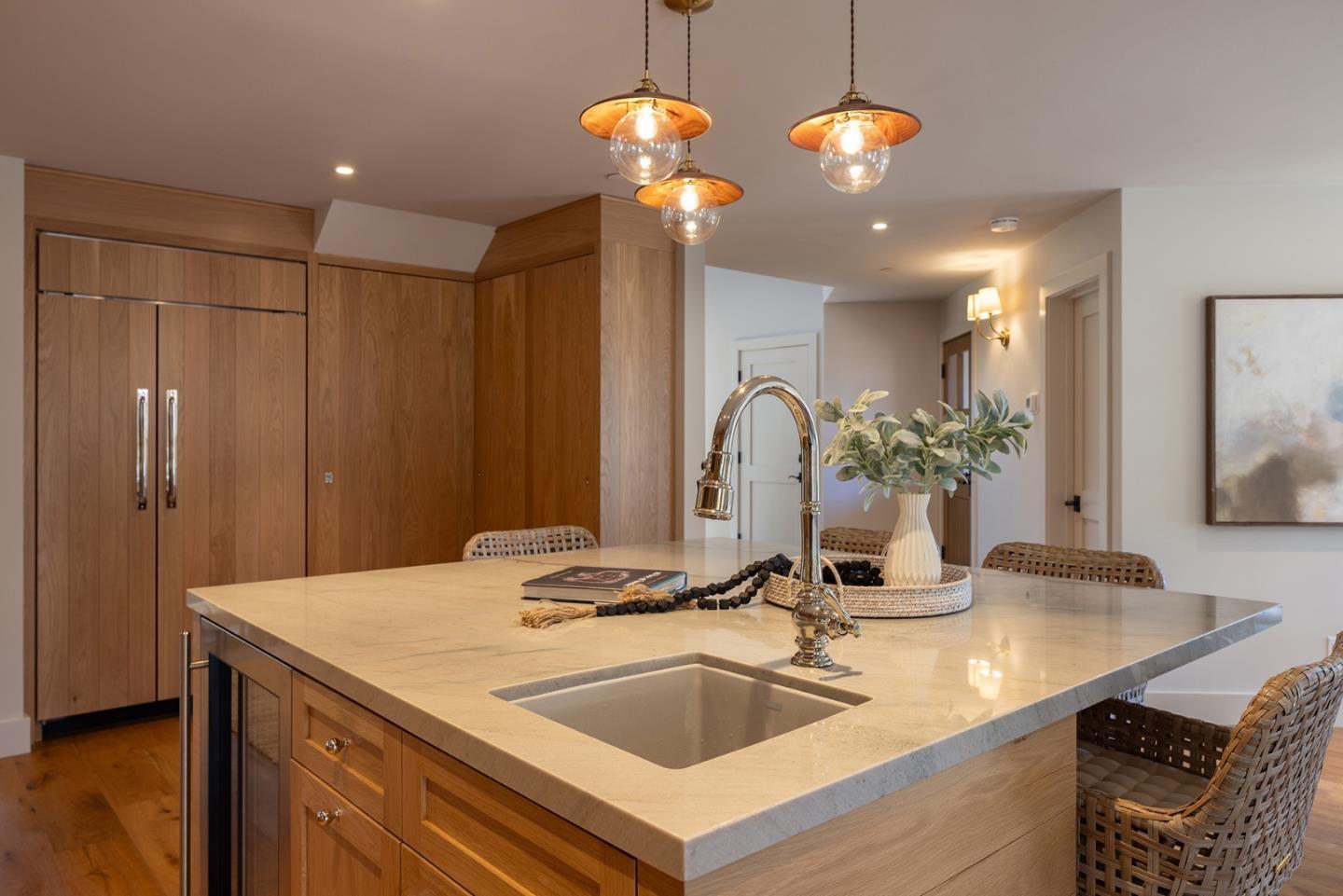 4 Oak Knoll Way Carmel, CA 93923 - Photo 21 of 49 a kitchen with a sink and a refrigerator
