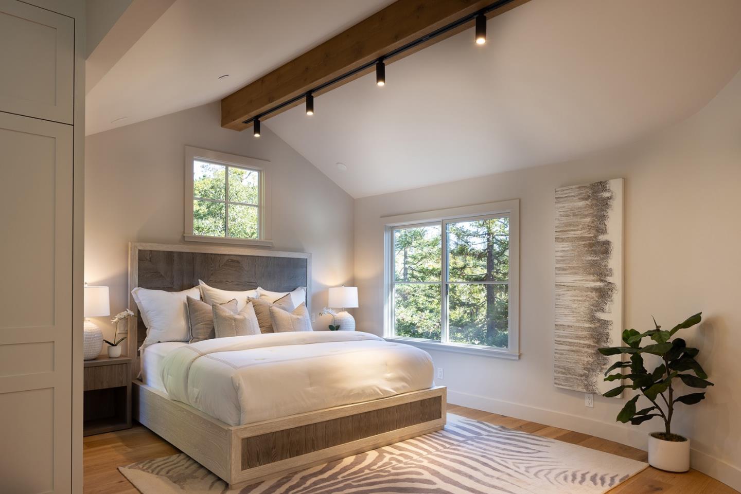 4 Oak Knoll Way Carmel, CA 93923 - Photo 29 of 49 a bedroom with a bed and a window