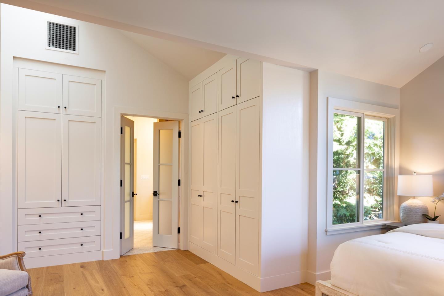 4 Oak Knoll Way Carmel, CA 93923 - Photo 31 of 49 a bedroom with a bed and a window