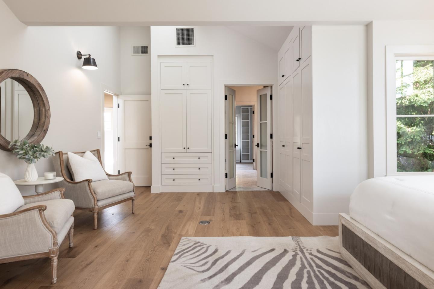 4 Oak Knoll Way Carmel, CA 93923 - Photo 33 of 49 a living room with furniture and a large mirror