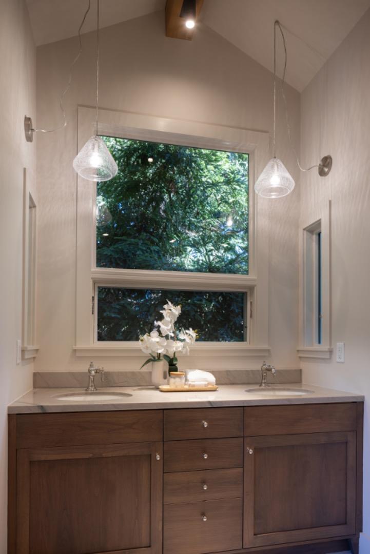 4 Oak Knoll Way Carmel, CA 93923 - Photo 34 of 49 a bathroom with a sink and a mirror