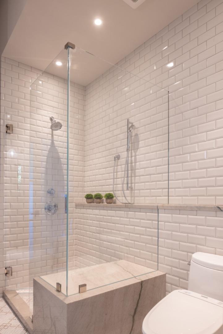 4 Oak Knoll Way Carmel, CA 93923 - Photo 38 of 49 a bathroom with a bathtub and shower