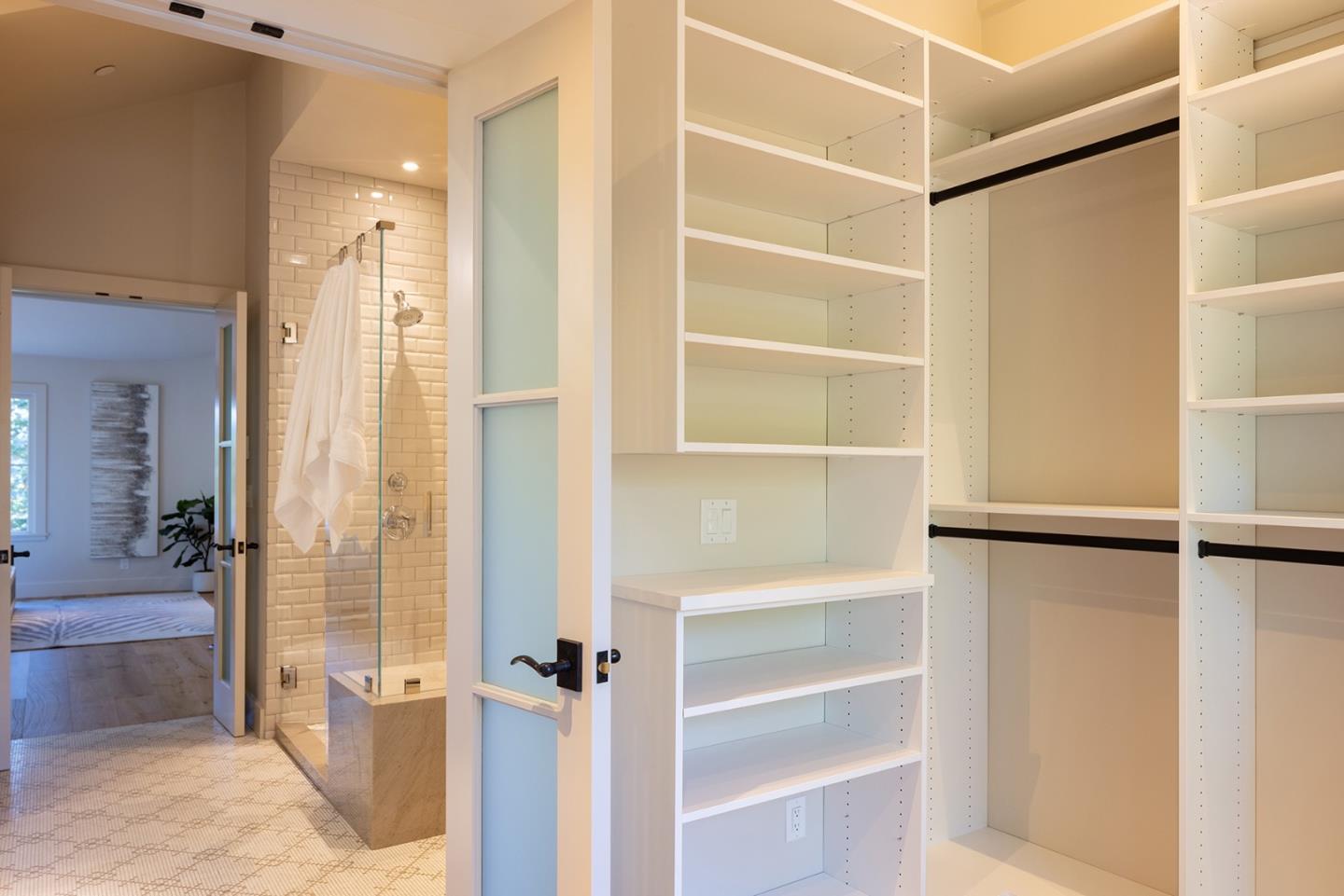 4 Oak Knoll Way Carmel, CA 93923 - Photo 39 of 49 a view of a walk in closet and bathroom