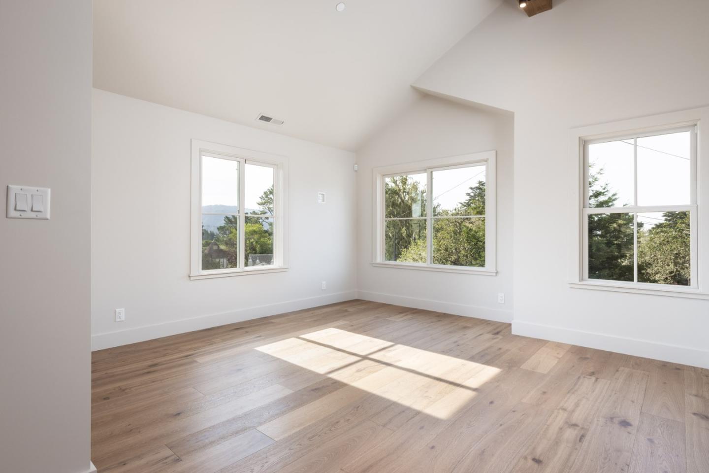 4 Oak Knoll Way Carmel, CA 93923 - Photo 43 of 49 an empty room with wooden floor and windows