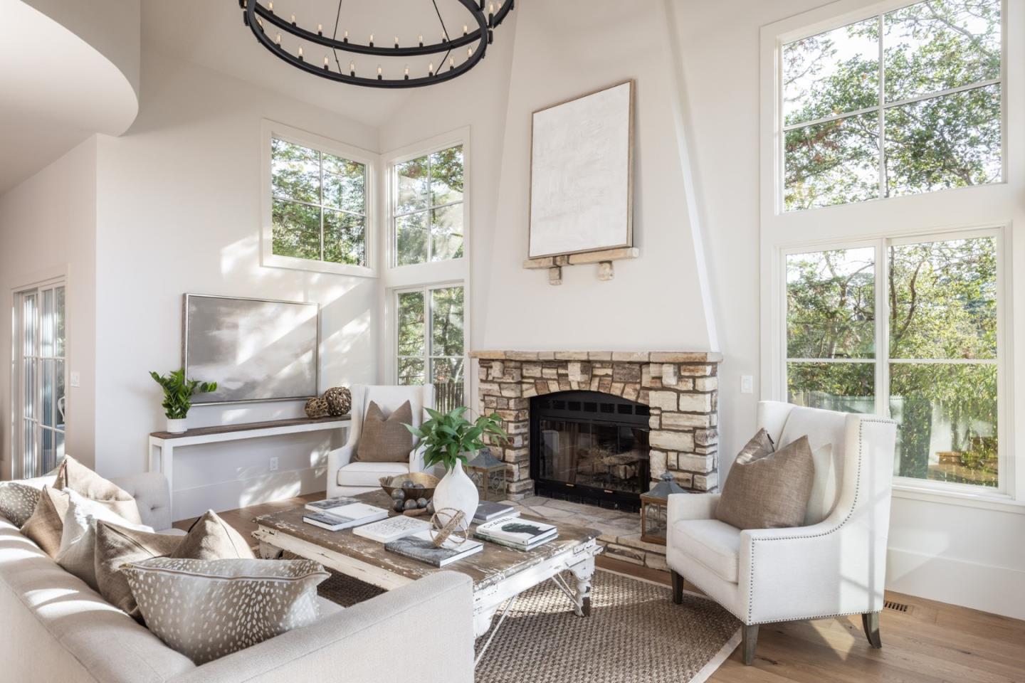 4 Oak Knoll Way Carmel, CA 93923 - Photo 6 of 49 a living room with furniture a window and a fireplace