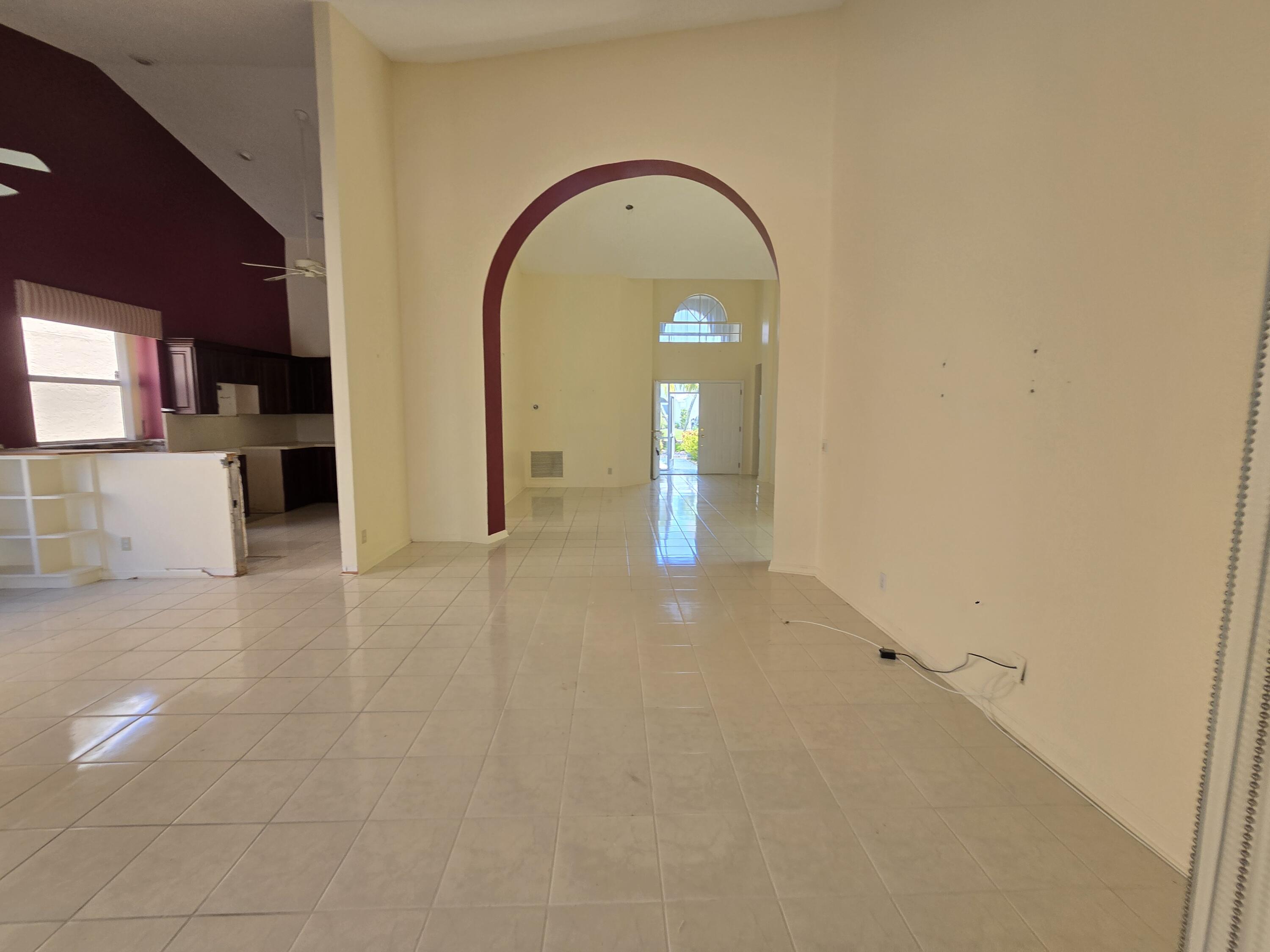 8384 Horseshoe Bay Road Boynton Beach, FL 33472 - Photo 11 of 33 an empty room with mirror in it