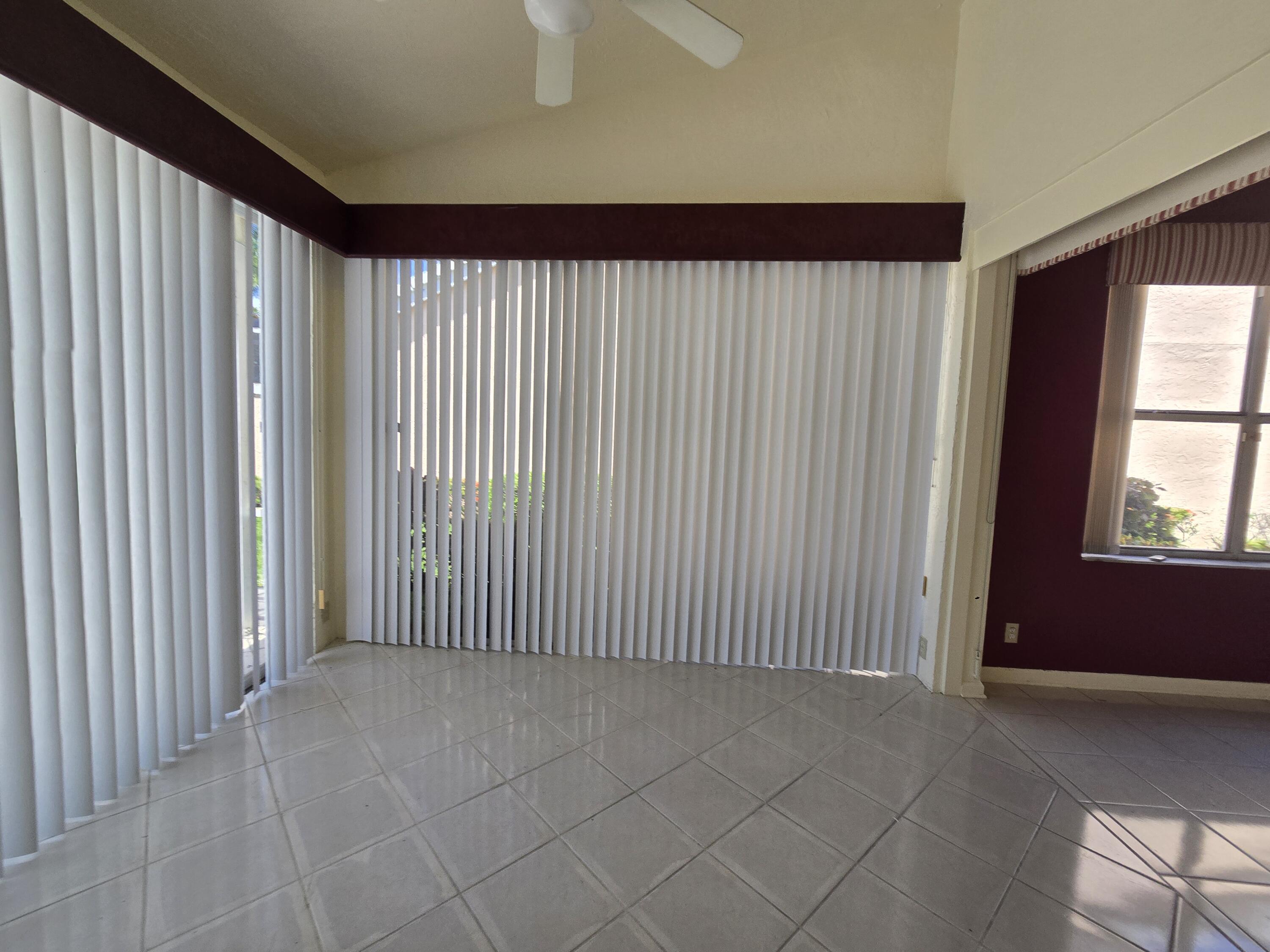 8384 Horseshoe Bay Road Boynton Beach, FL 33472 - Photo 12 of 33 an empty room with windows