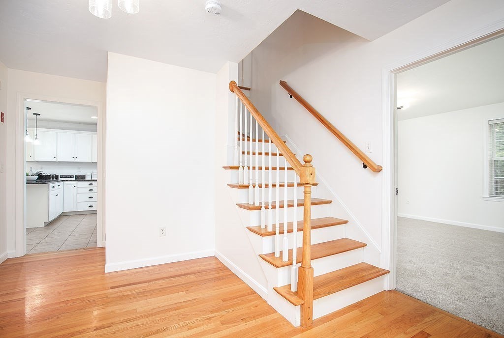 7 Draper Woods Road Sturbridge, MA 01518 - Photo 3 of 38 a view of entryway and hall with wooden floor