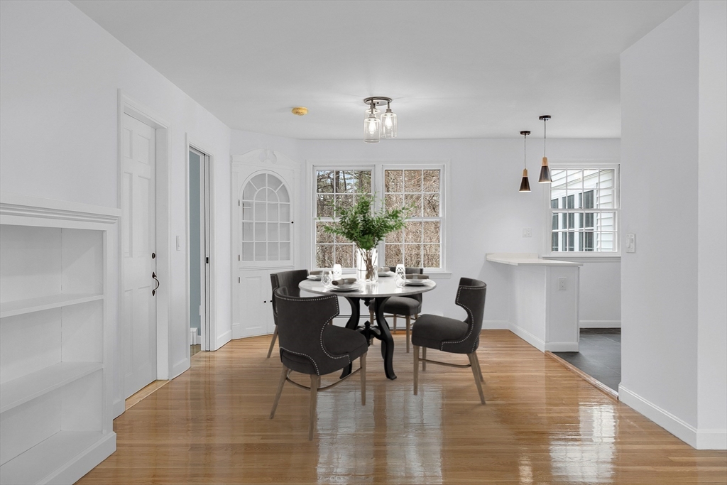 150 Fisher Road Fitchburg, MA 01420 - Photo 5 of 41 a view of a dining room with furniture window and wooden floor