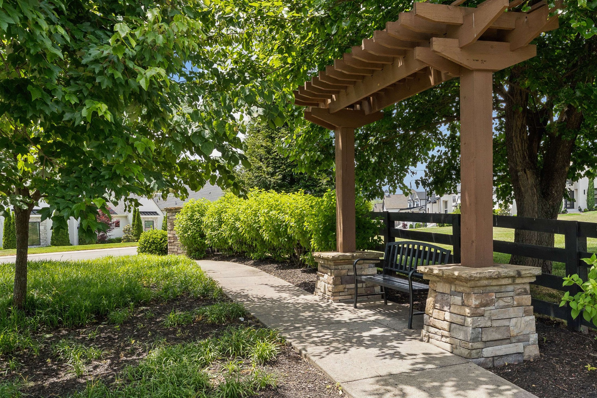 6004 Lookaway Circle Franklin, TN 37067 - Photo 69 of 71 a view of a patio with table and chairs potted plants and large tree