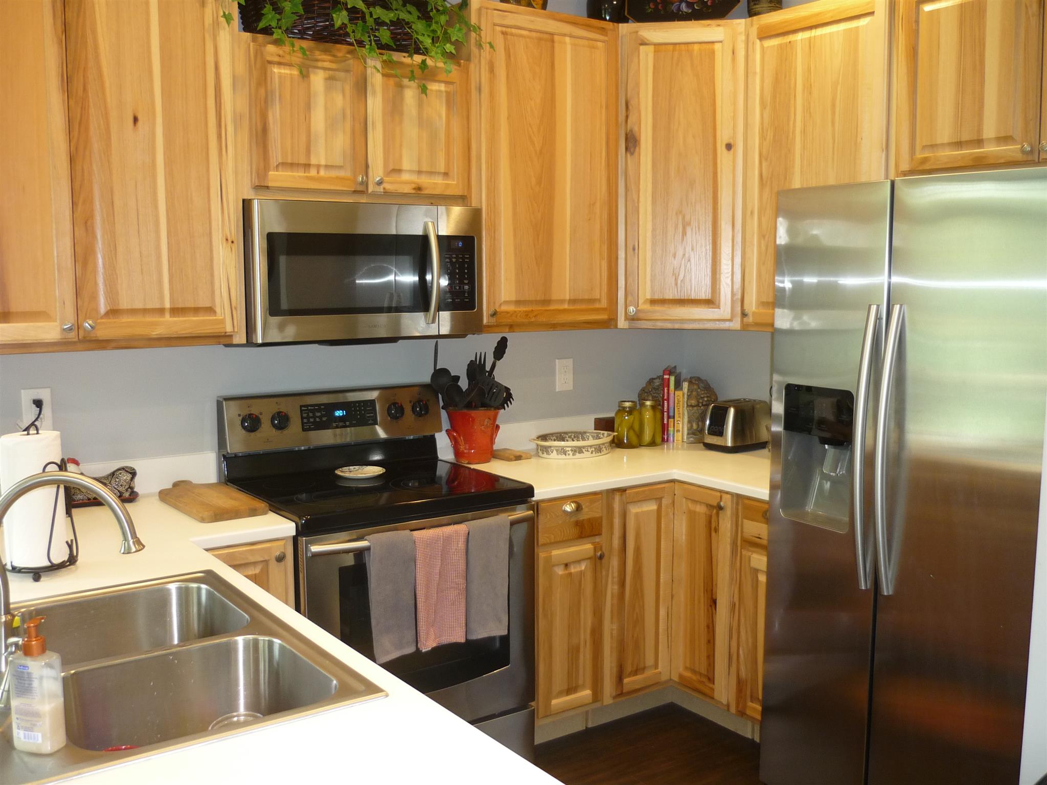705 Union Ridge Road Wartrace, TN 37183 - Photo 11 of 13 a kitchen with stainless steel appliances a stove a sink and a microwave