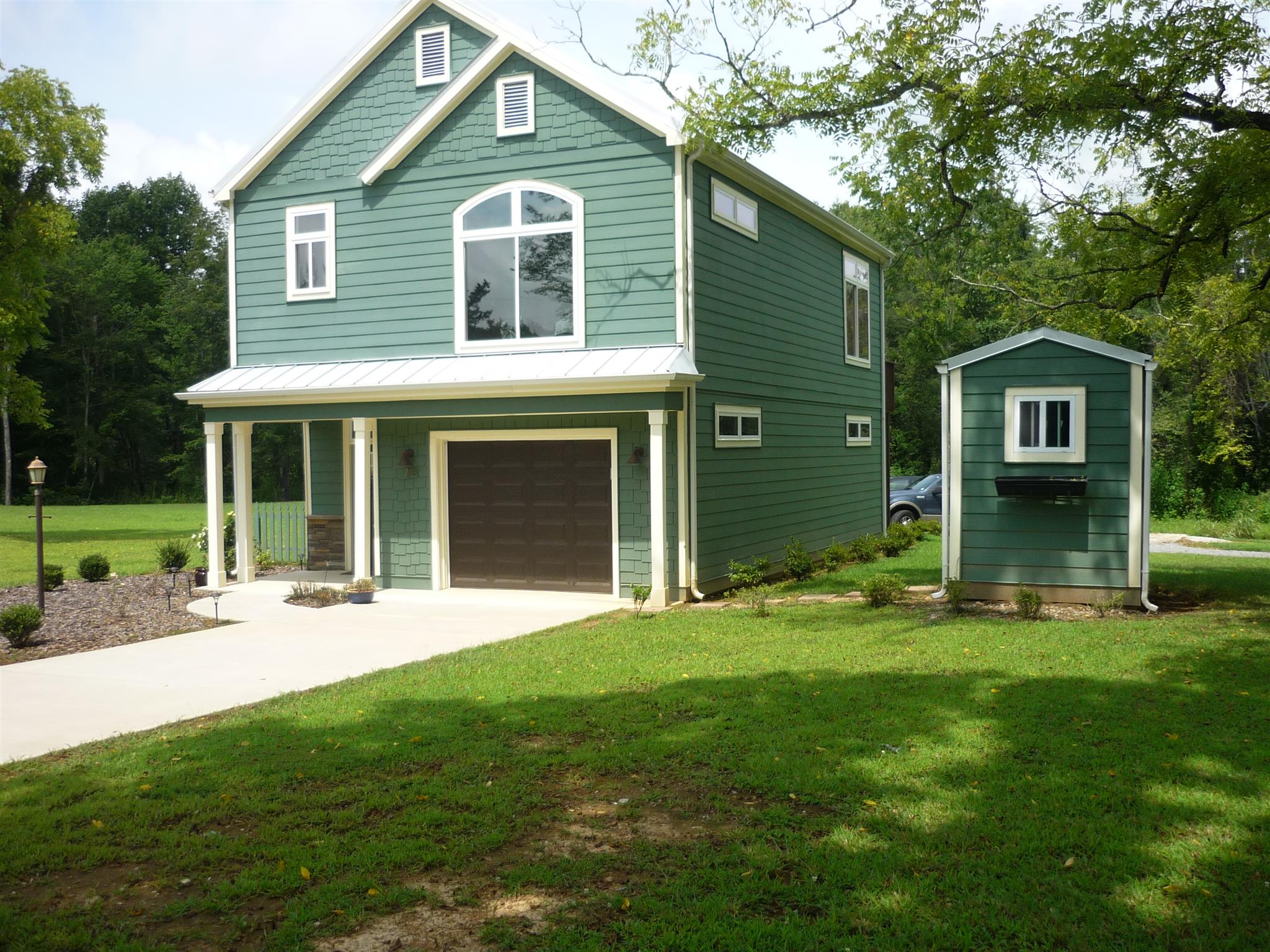 705 Union Ridge Road Wartrace, TN 37183 - Photo 3 of 13 a front view of a house with a yard and trees