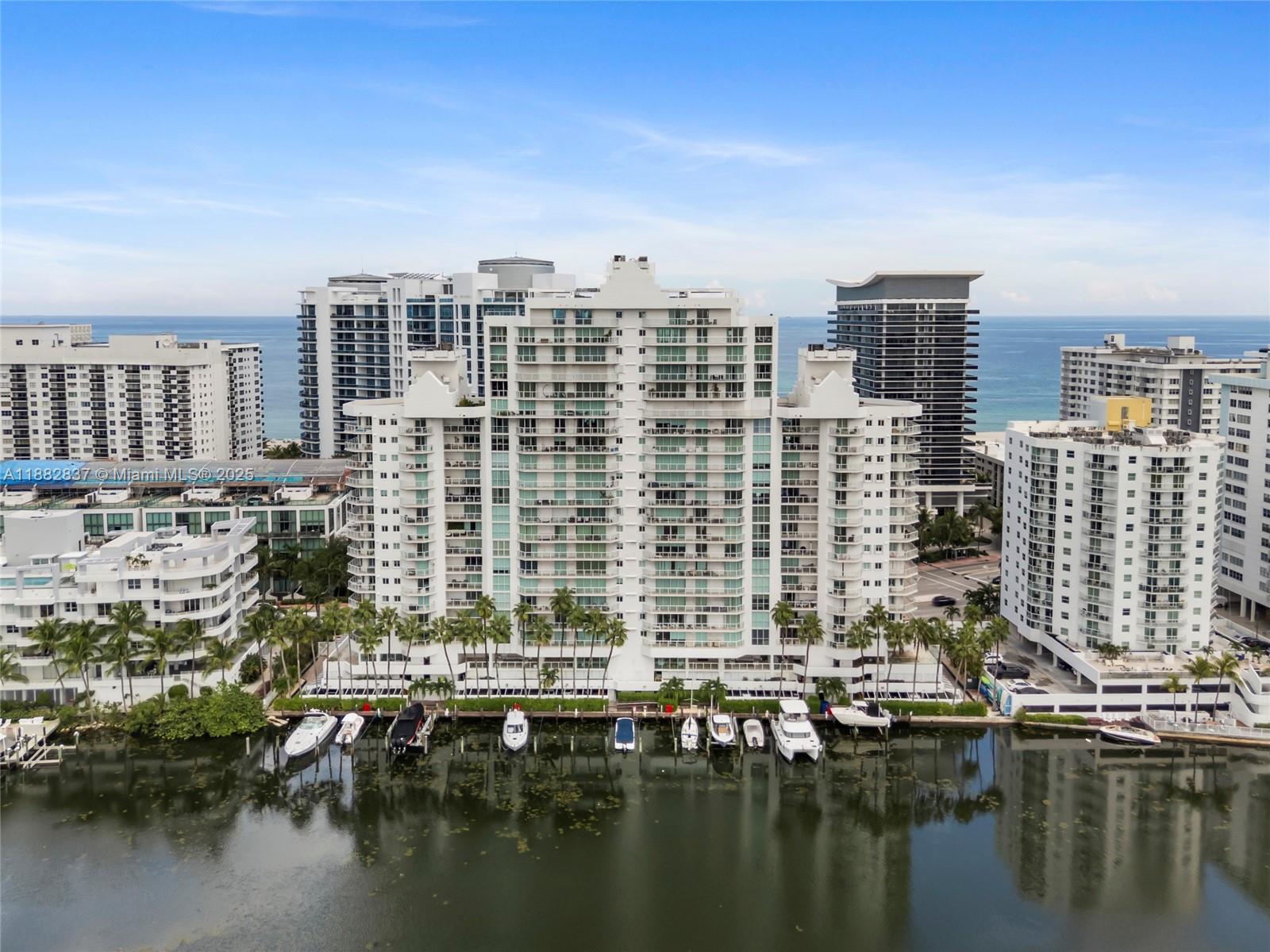 5900 Collins Avenue, Unit 604 Miami Beach, FL 33140 - Photo 2 of 30 a view of a city with tall buildings
