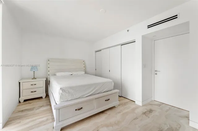 a bathroom with a shower and toilet