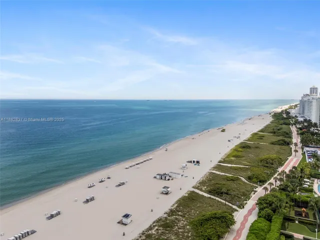 an aerial view of beach and ocean