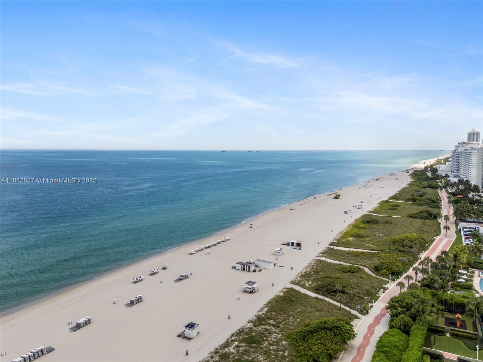 5900 Collins Avenue, Unit 604 Miami Beach, FL 33140 - Photo 5 of 30 an aerial view of beach and ocean