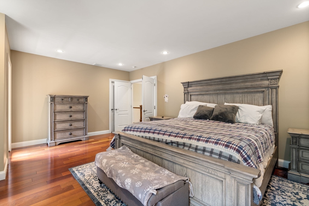 24 Wayside Inn Road Framingham, MA 01701 - Photo 33 of 38 a bedroom with a bed and furniture