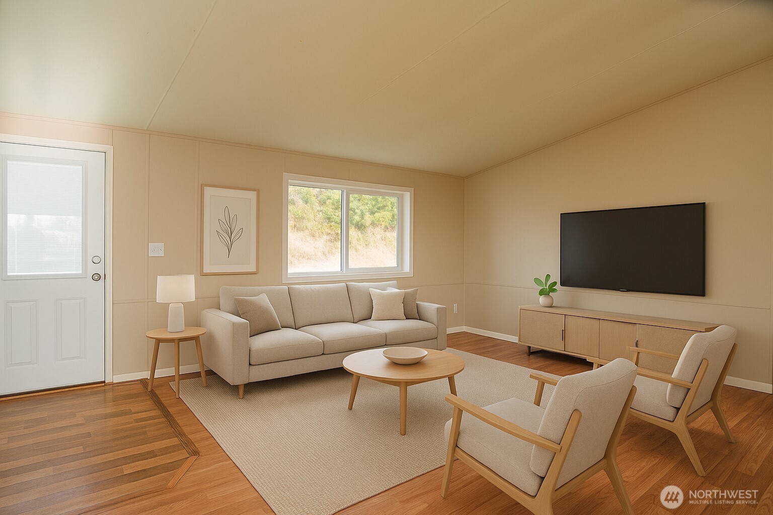 5541 Bayvue Road Blaine, WA 98230 - Photo 2 of 14 a living room with furniture and a flat screen tv