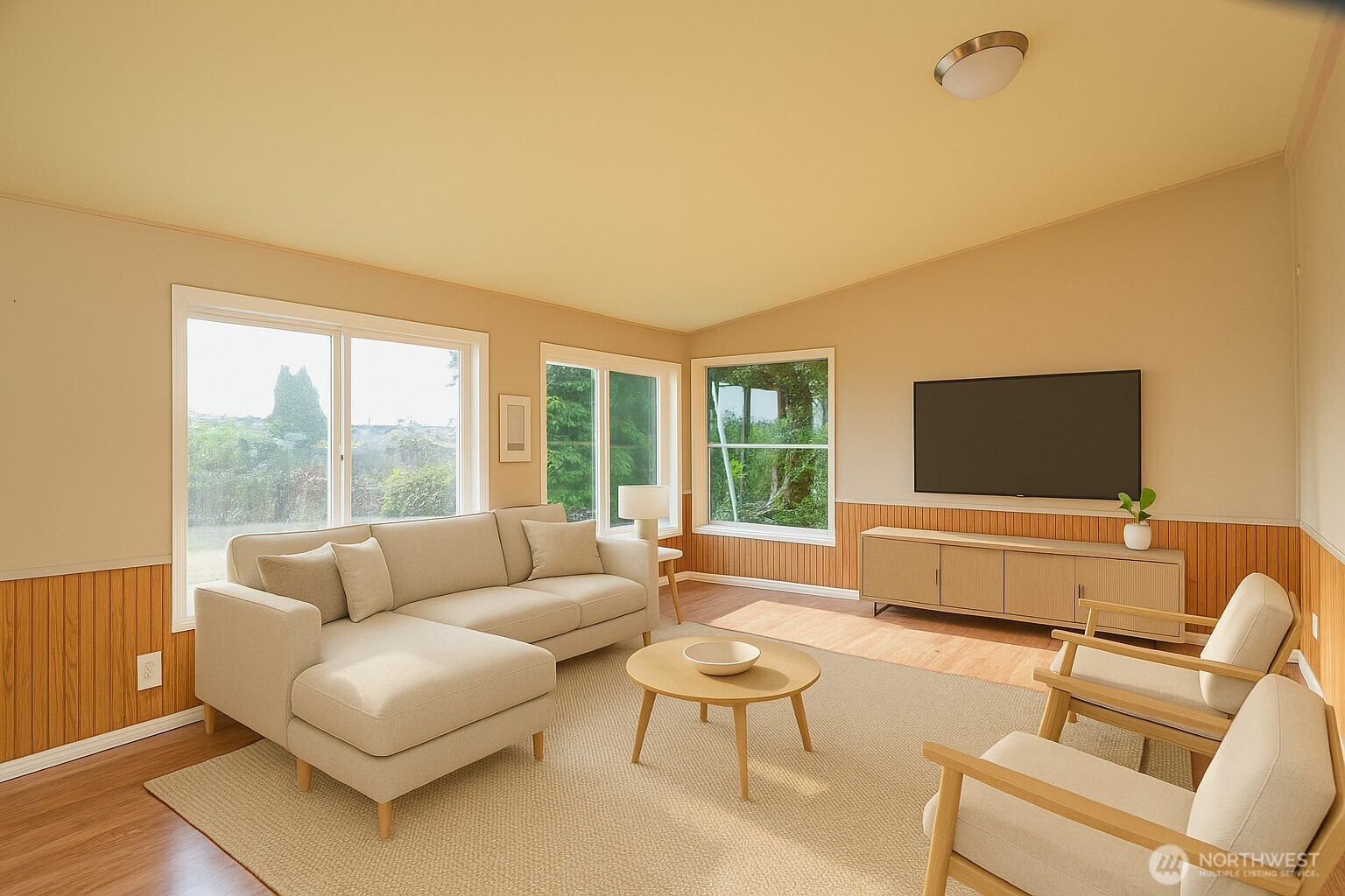 5541 Bayvue Road Blaine, WA 98230 - Photo 6 of 14 a living room with furniture and a flat screen tv
