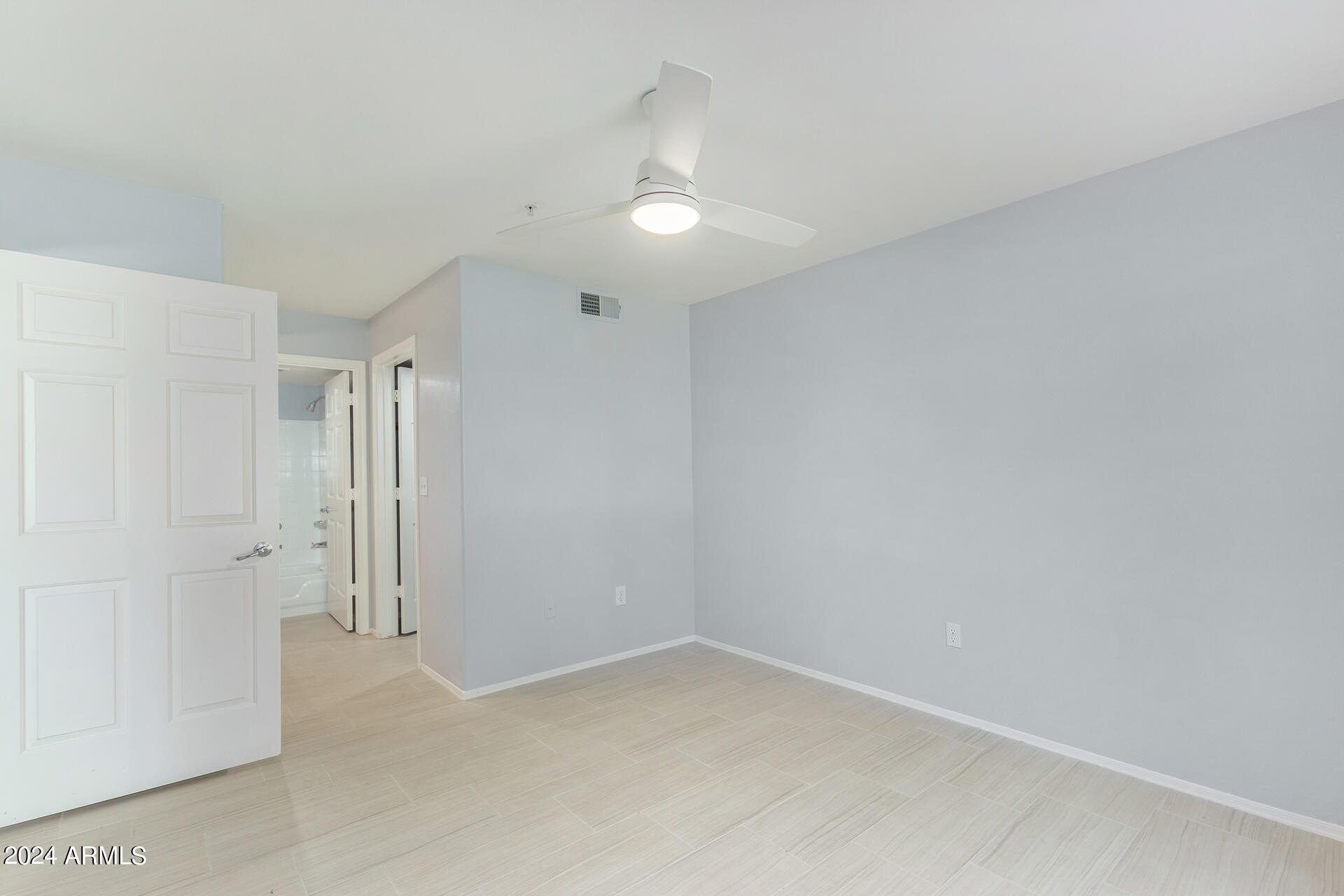 9990 North Scottsdale Road, Unit 1030 Paradise Valley, AZ 85253 - Photo 21 of 40 wooden floor in an empty room