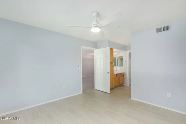 an empty room with a bathroom