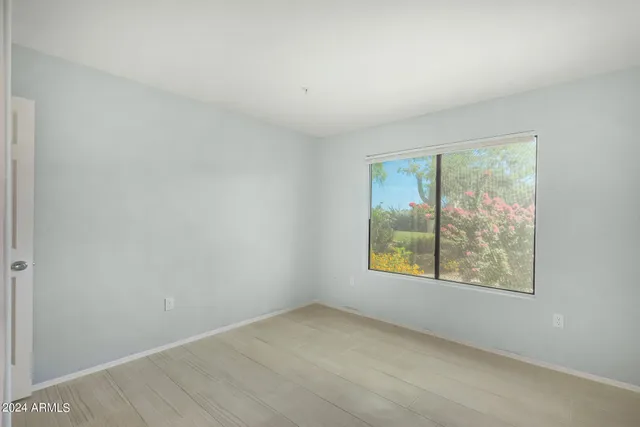 an empty room with windows