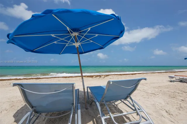 a patio with table and chairs
