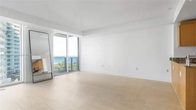 an empty room with sliding door