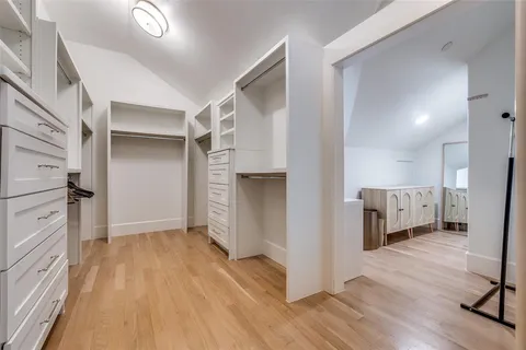 a view of kitchen with furniture and wooden floor