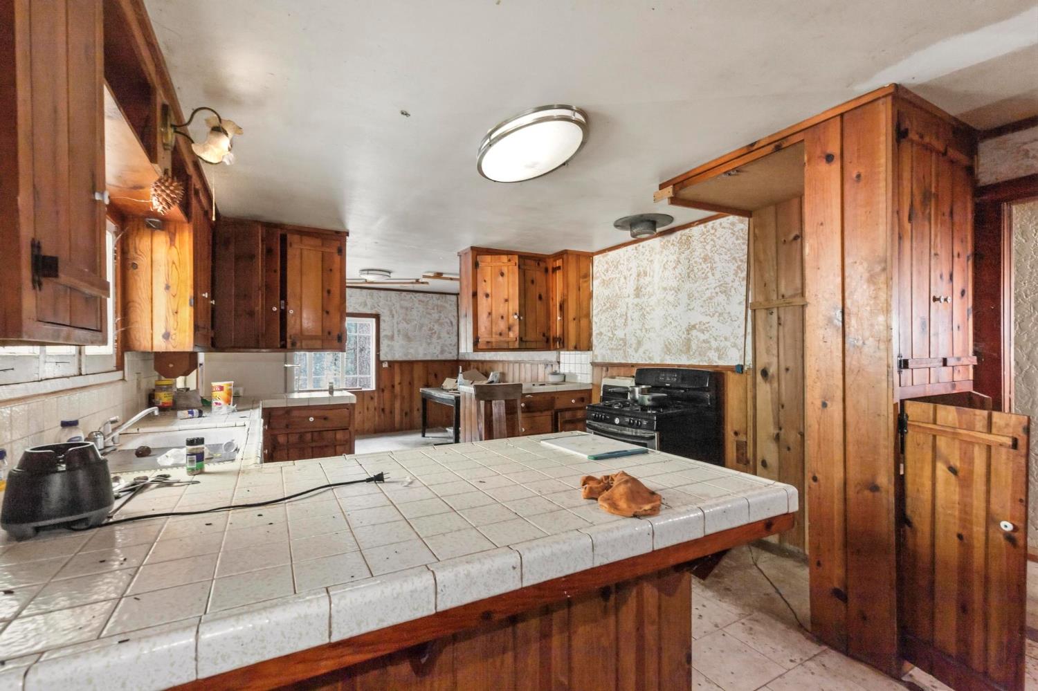 13887 La Porte Road Strawberry Valley, CA 95981 - Photo 11 of 37 a view of a kitchen and dining room