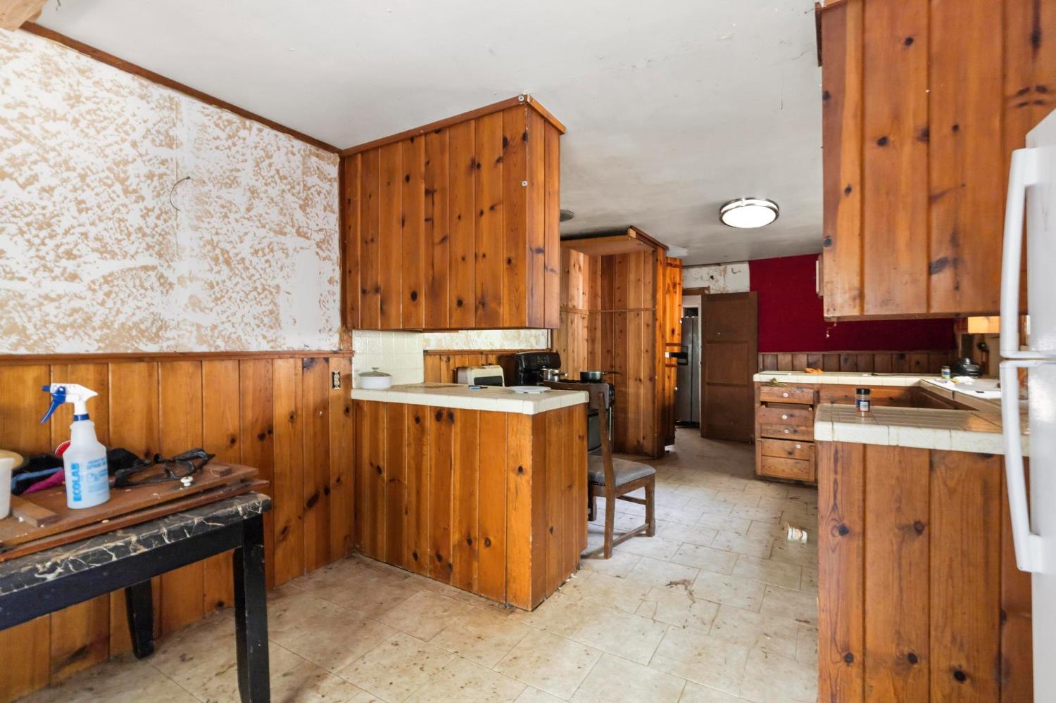13887 La Porte Road Strawberry Valley, CA 95981 - Photo 13 of 37 a kitchen with stainless steel appliances a stove and a refrigerator