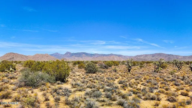 a view of an outdoor space with mountain