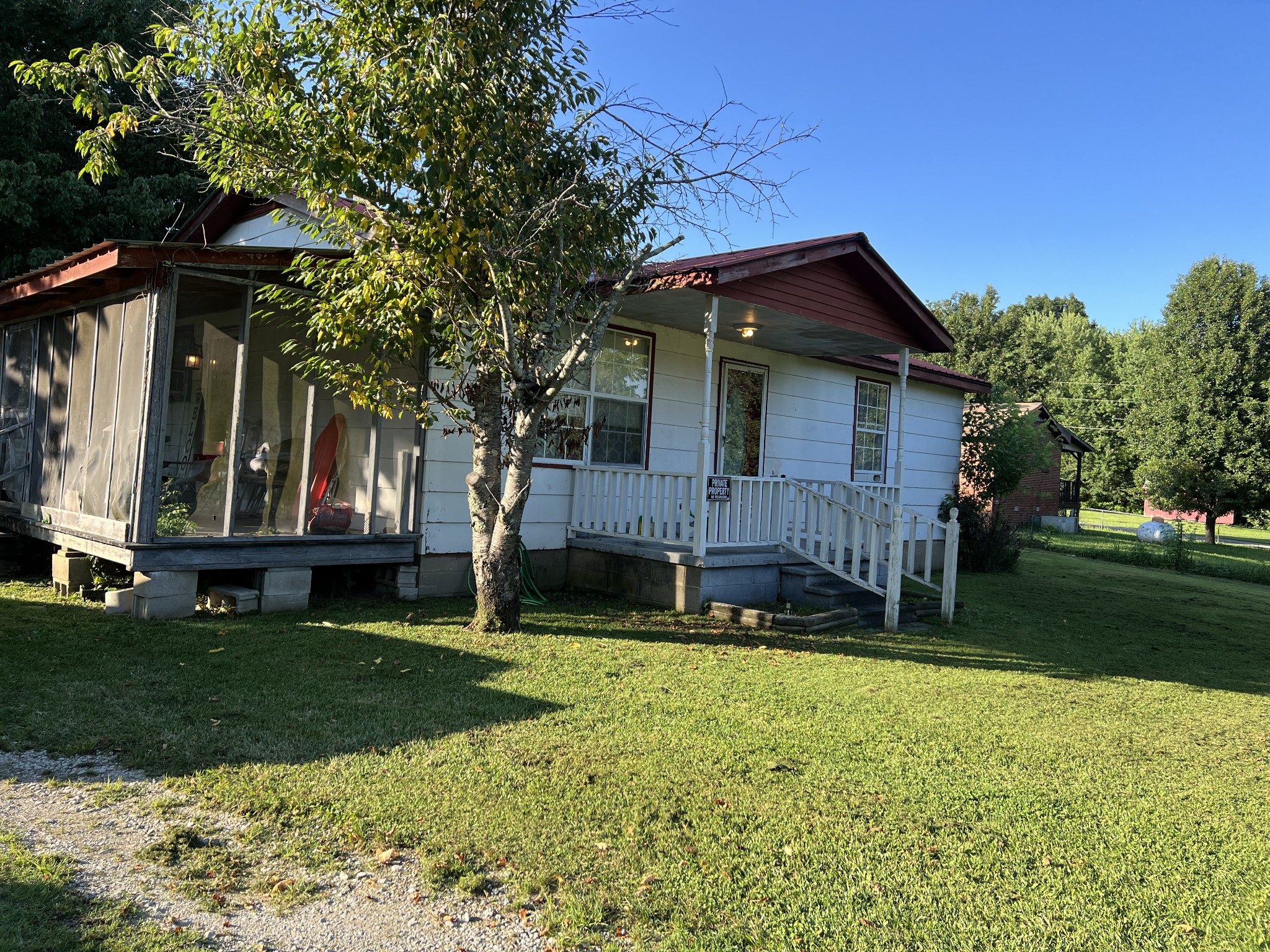 121 Dell Road Gruetli Laager, TN 37339 - Photo 11 of 14 a view of a house with a yard