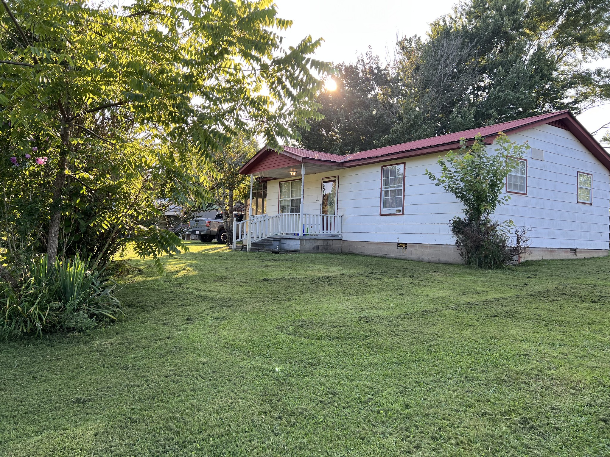121 Dell Road Gruetli Laager, TN 37339 - Photo 12 of 14 a view of a house with a backyard