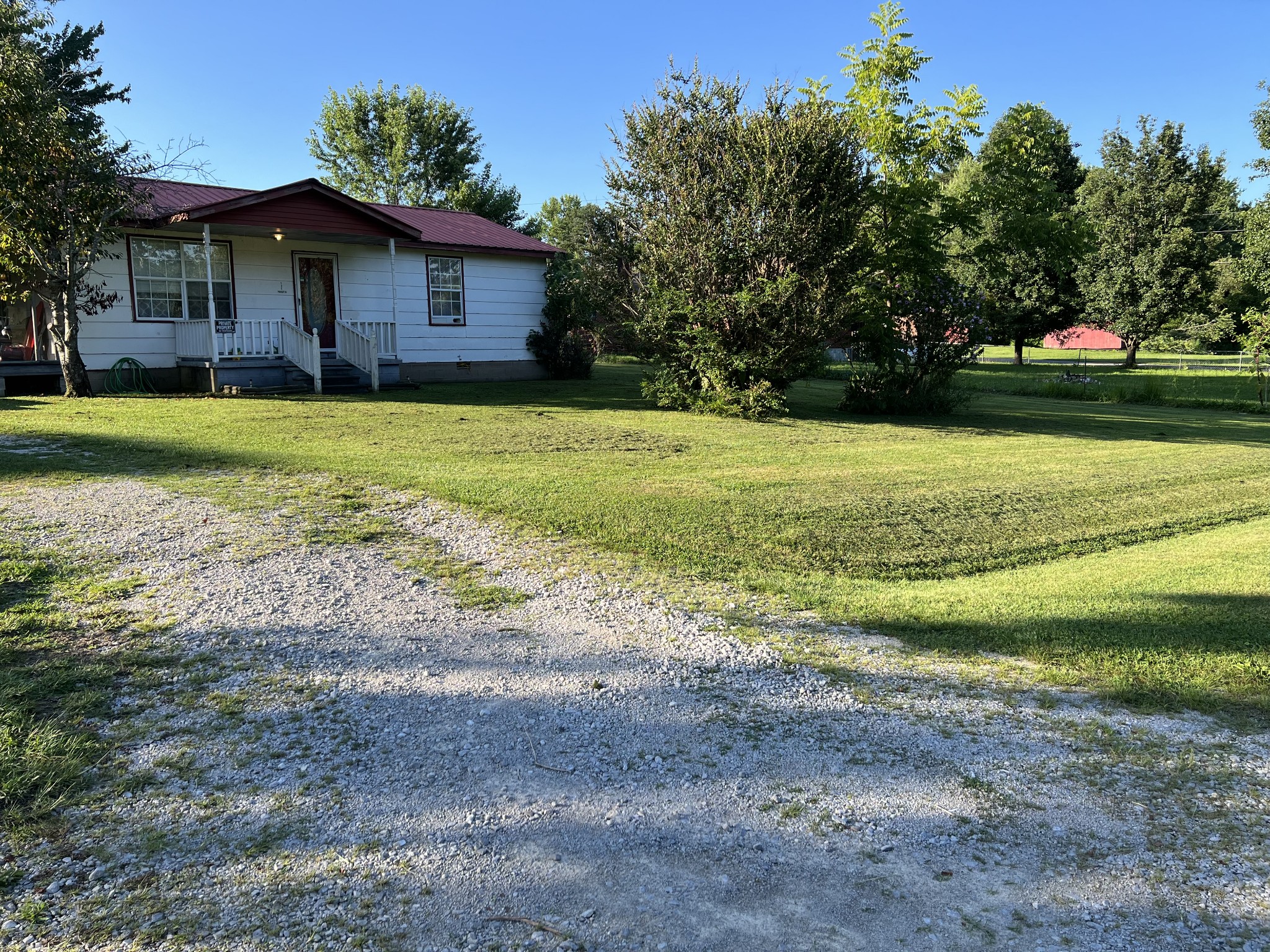 121 Dell Road Gruetli Laager, TN 37339 - Photo 10 of 14 a view of a house with a yard