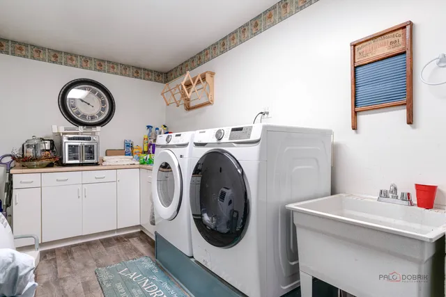 a utility room with dryer and washer