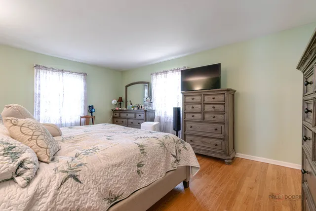 a bedroom with a bed and furniture