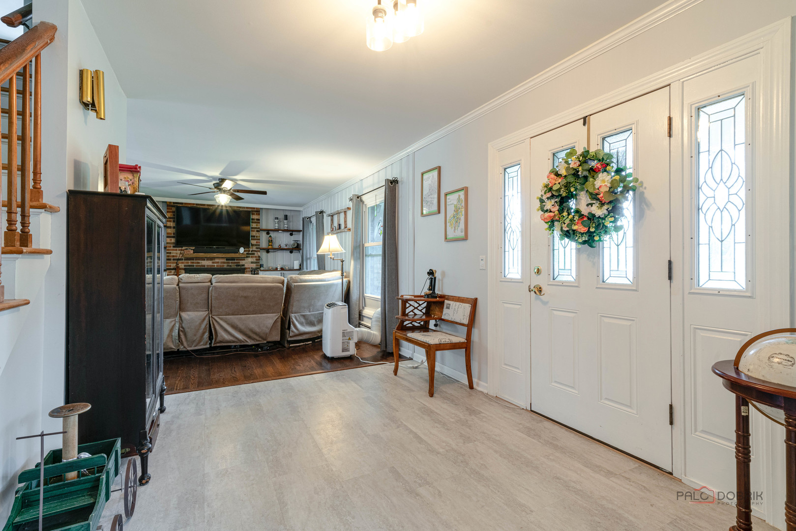 820 Black Partridge Road McHenry, IL 60051 - Photo 4 of 34 a living room with furniture and a potted plant